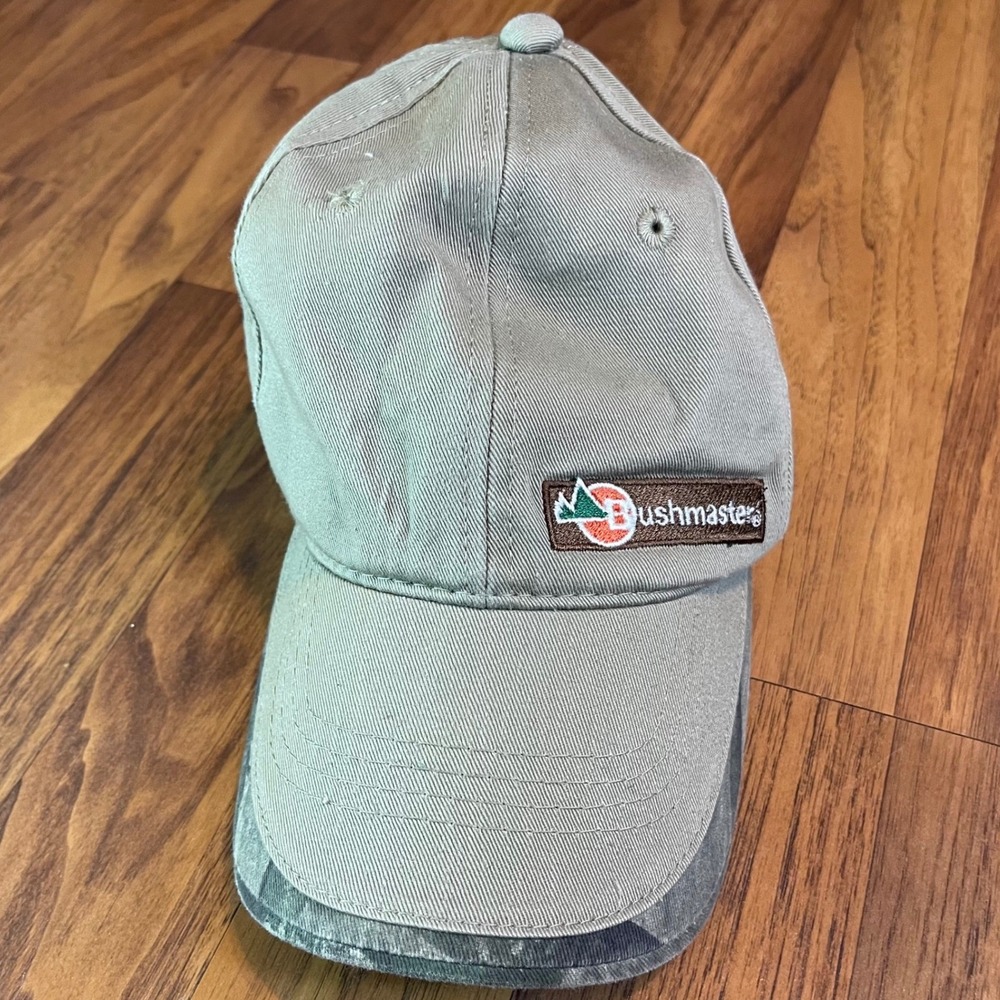 Bushmaster Firearms Hat Mens OSFA Tan Khaki Mossy Oak Camo Brim Adjustable Cap